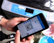 高校宿舍现共享洗衣机   学生足不出“户”就能洗衣